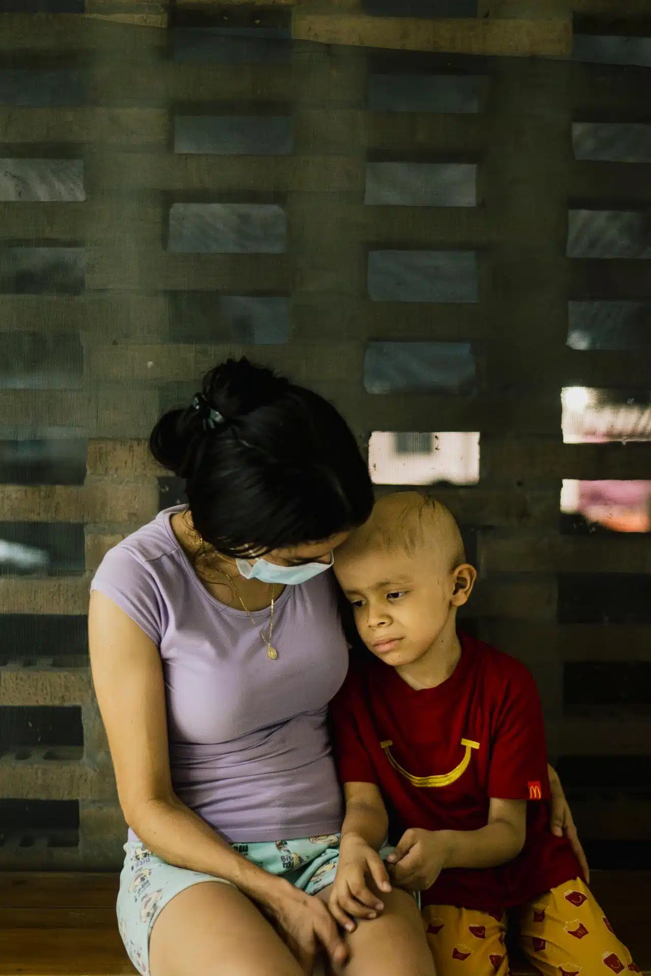 Woman holding her child